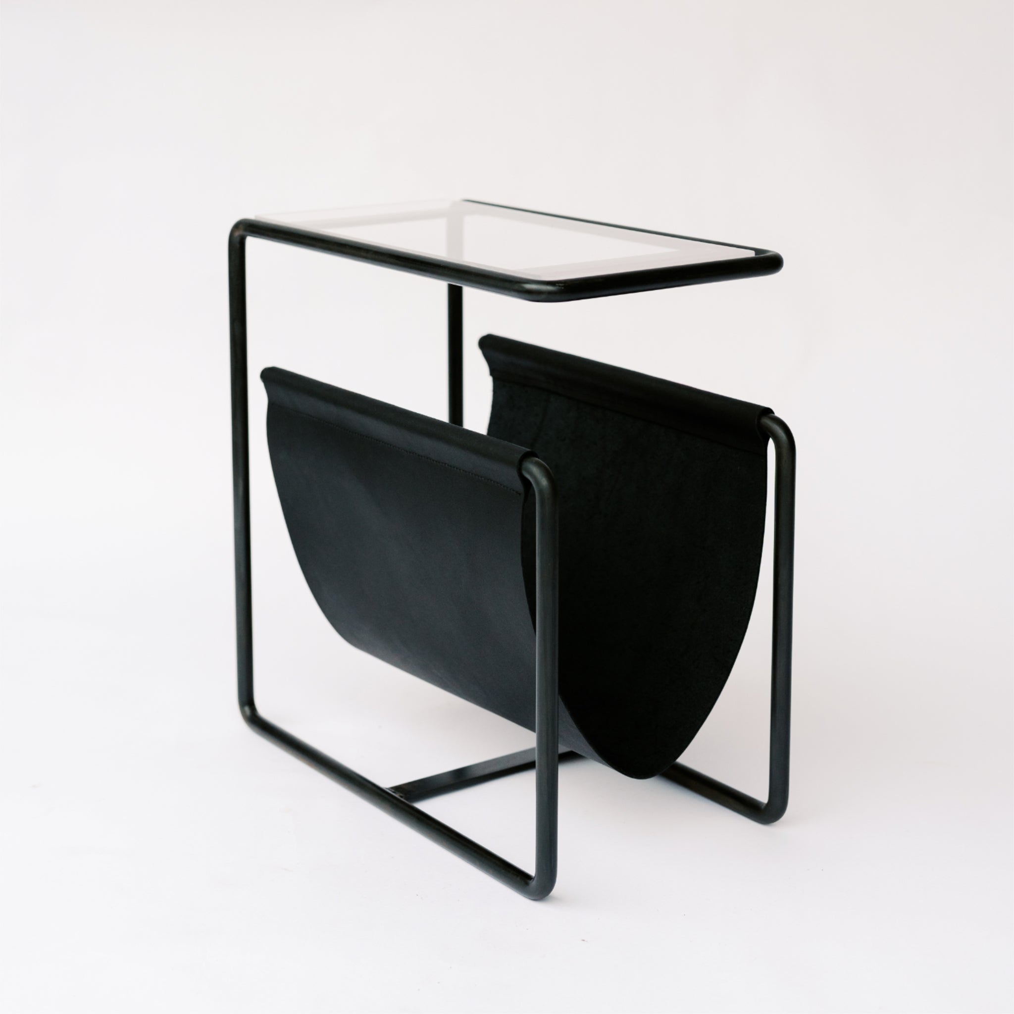 Black Oxide dark  steel and black full-grain leather magazine rack side table with tempered glass top