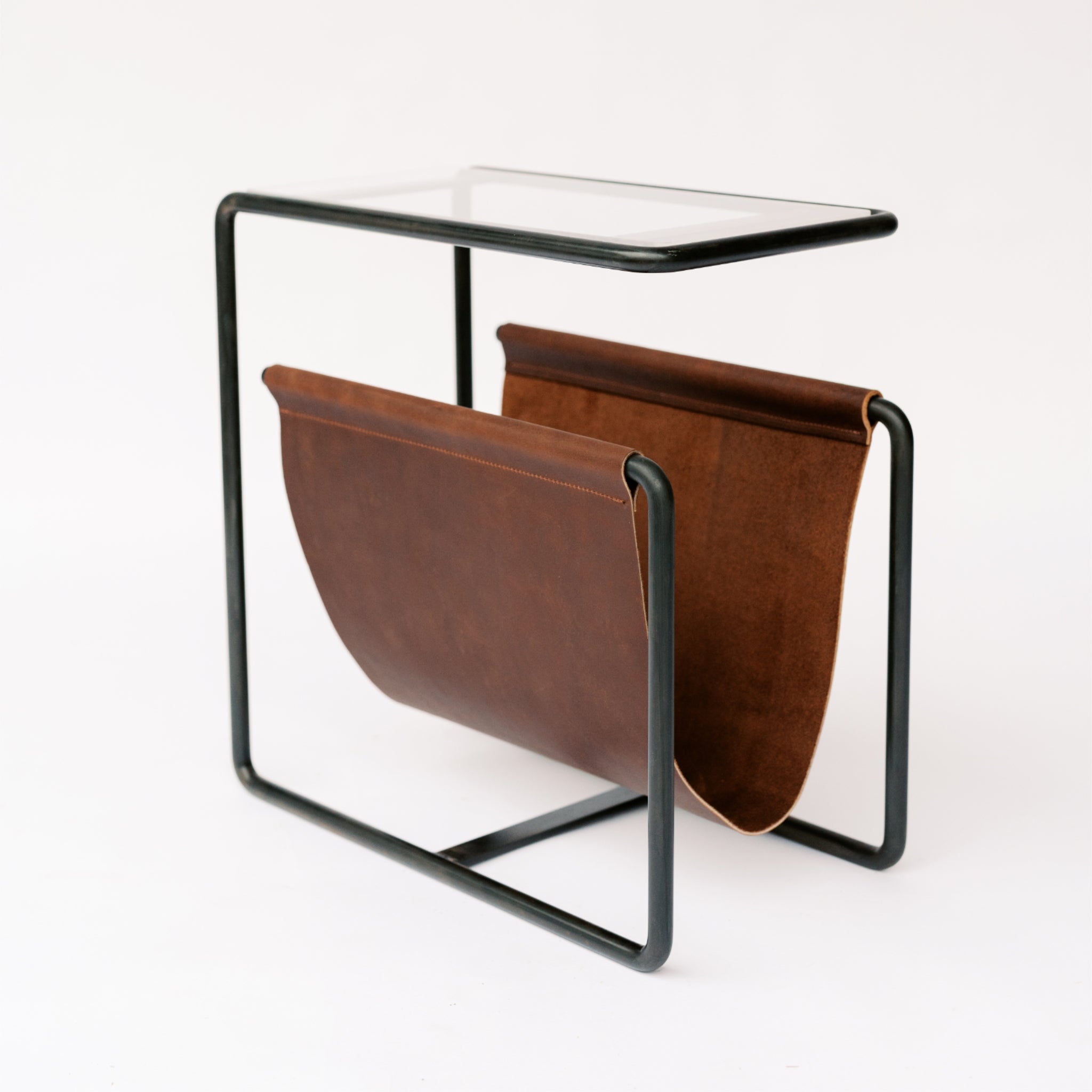 Black Oxide dark  steel and chocolate brown full-grain leather magazine rack side table with tempered glass top