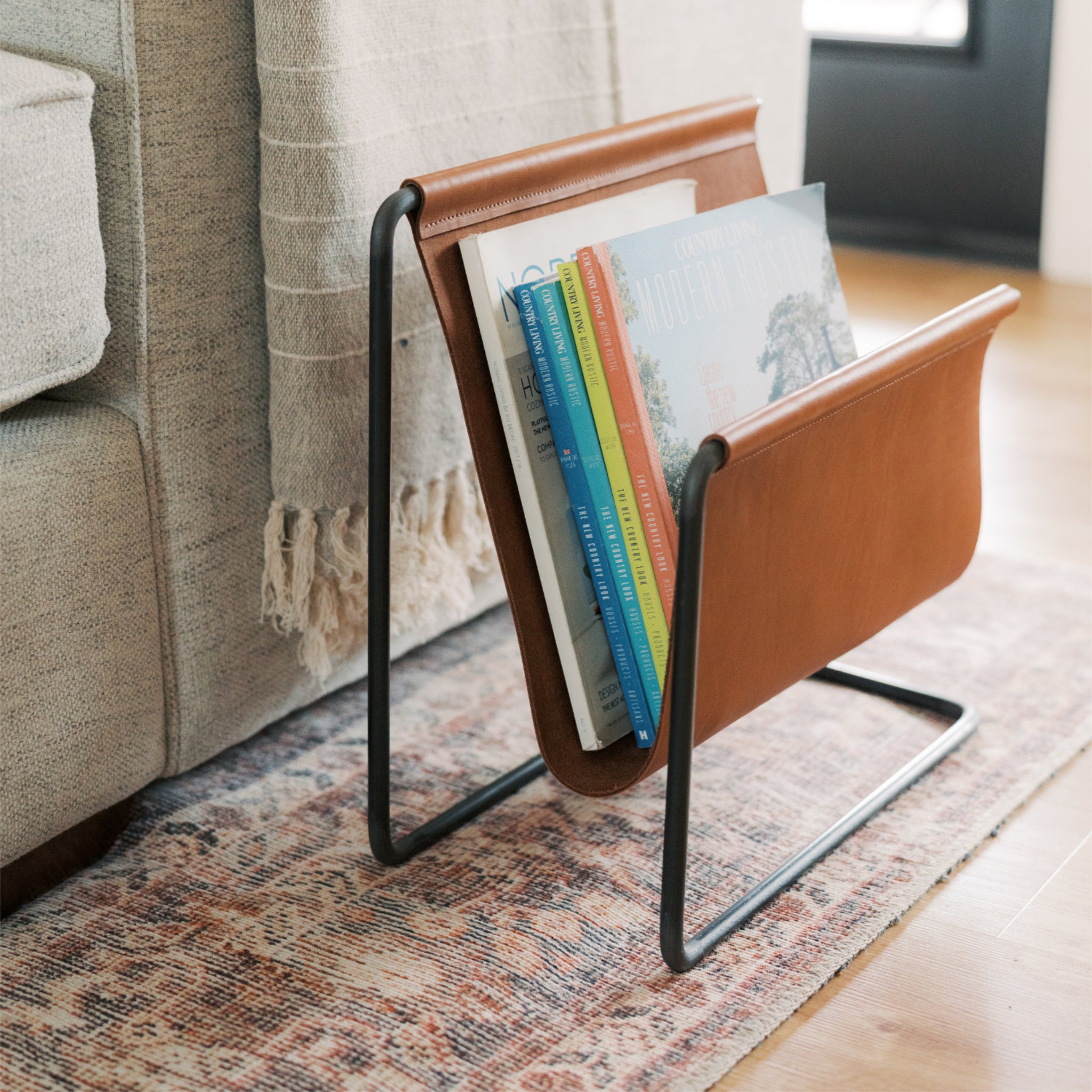 Steel and Leather Magazine Rack